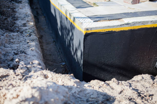 Professional Waterproofing technician working in Mattoon, IL